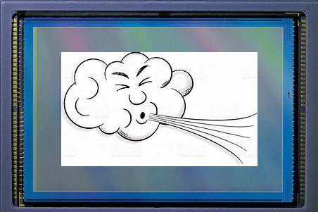 Close-up shot of a camera sensor, with a picture of a cartoon cloud blowing that has been edited in the centre of the screen